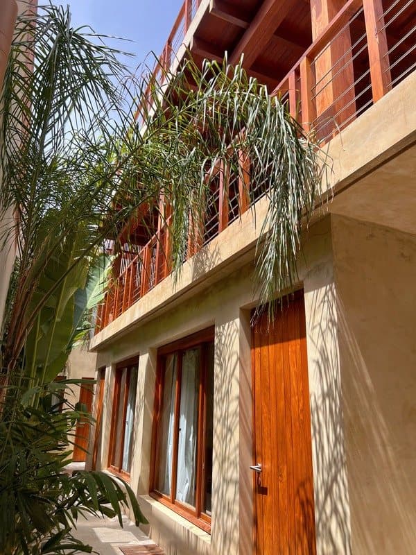 Balconies and wooden doors on the façade.
