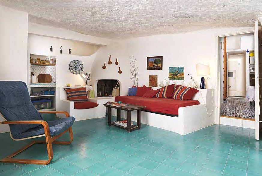 The guest house living room, partly carved into the rock.