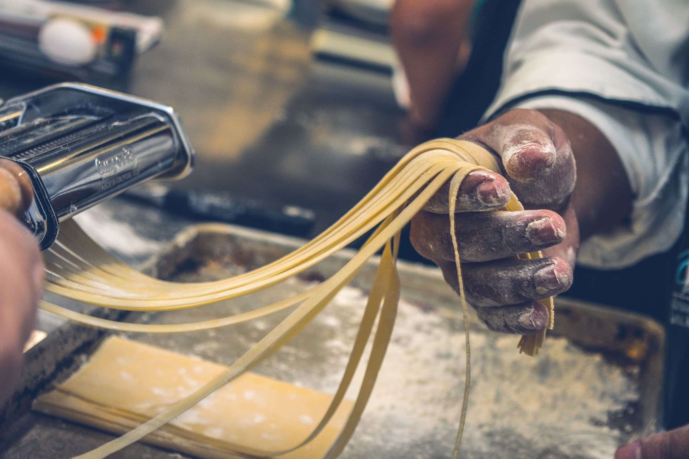 Fresh pasta being made by hand